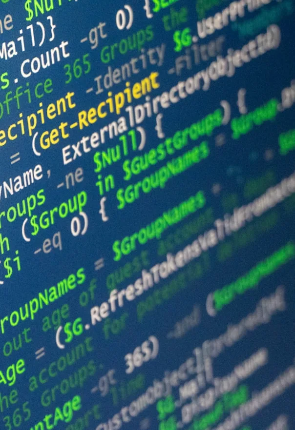 Software code on a monitor representing backend and tooling work.